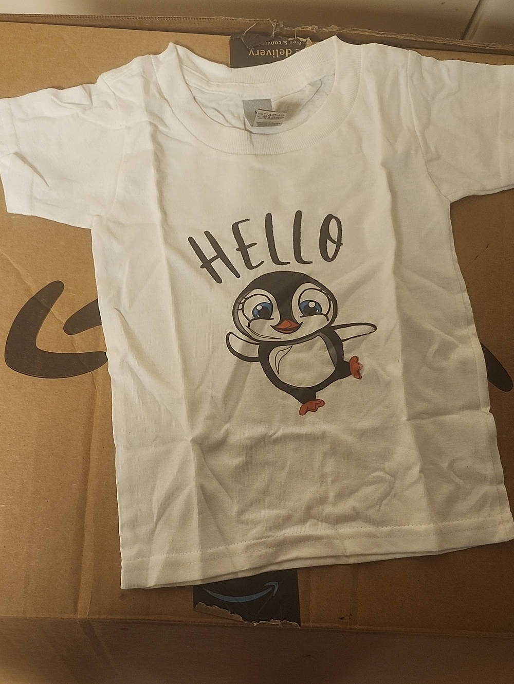 Handcrafted White Kids T-Shirt with Cute Penguin 'HELLO' Graphic